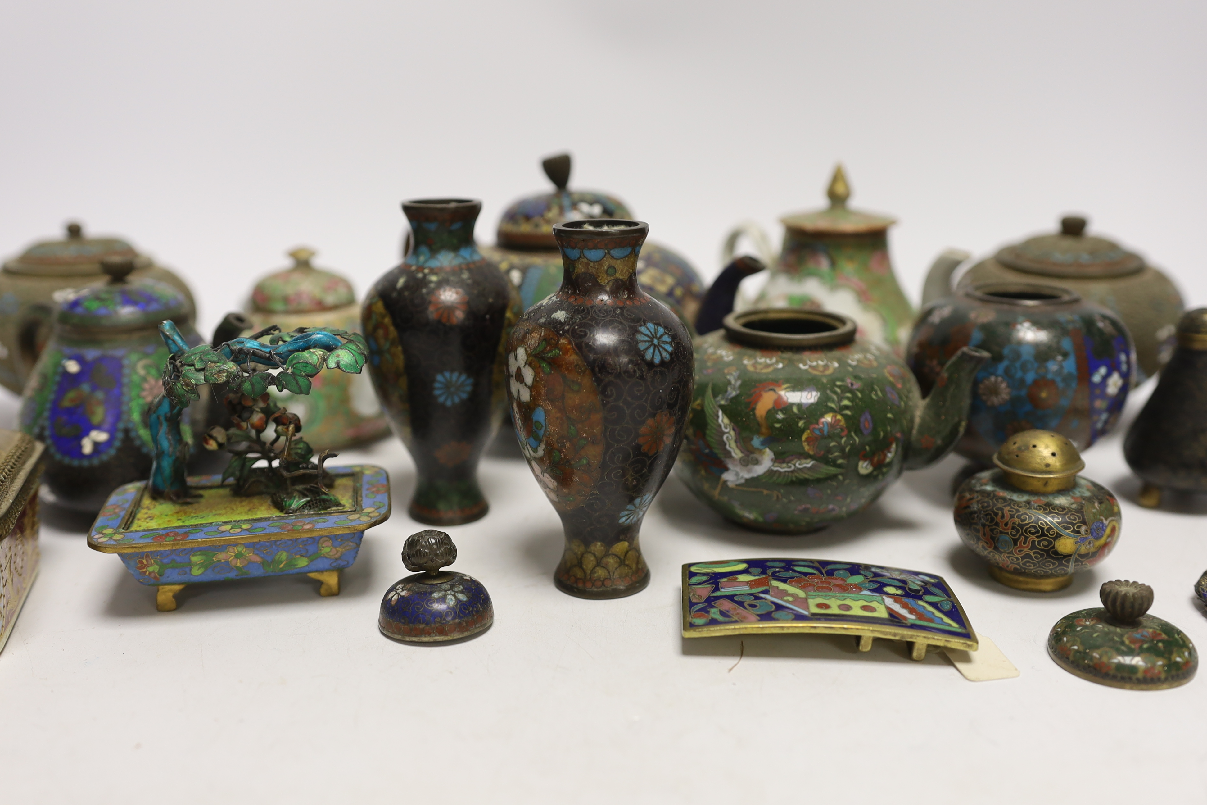 Two miniature Cantonese porcelain teapots, and a small collection of Chinese and Japanese cloisonné and champlevé enamel wares (12)